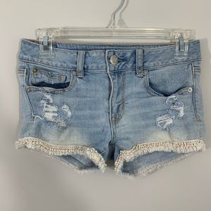 American eagle tassel trim distressed shorties
